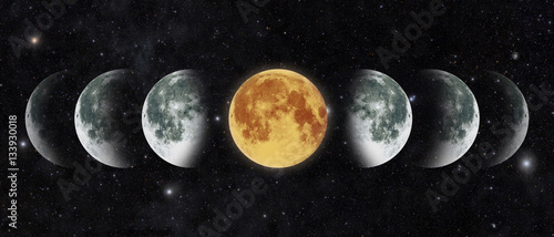 Moon lunar cycle in night sky