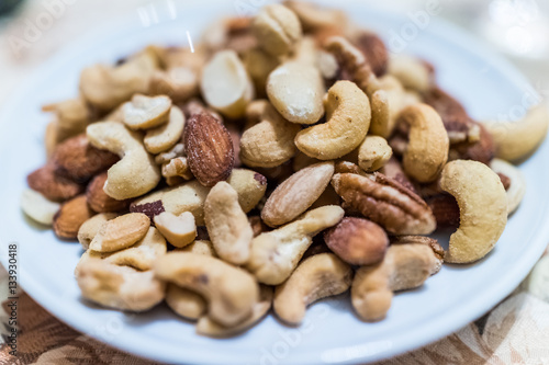 Wallpaper Mural Macro closeup of salted mixed nuts in plate Torontodigital.ca