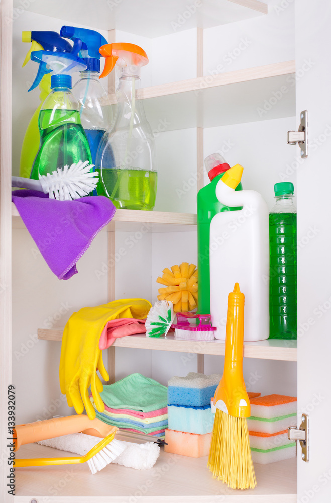 Cleaning tools and products in storage place Cleaning tools and products in storage place