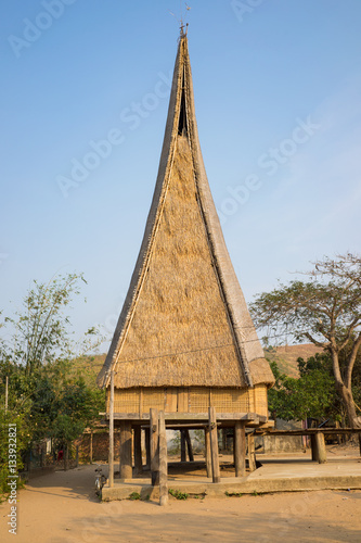 Rong house in Bahnar villages in Central Vietnam. The Rong is used as a venue for festivals and village meetings, is the communal house of villages of the Bahnar, Jarai and other ethnic minorities photo