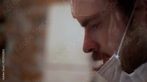 Man's face in the mask close-up photo