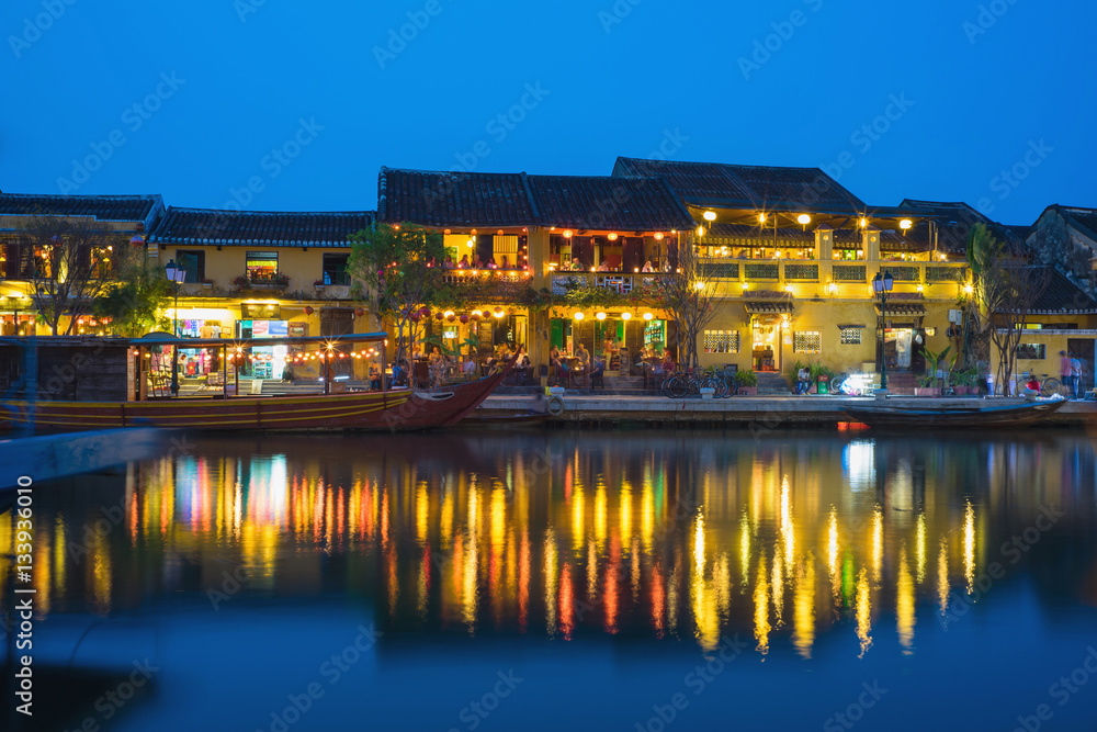 Quang Nam, Vietnam - Apr 1, 2016: Hoi An ancient town viewing from Thu Bon river by twilight period. Hoi An is UNESCO world heritage, one of the most popular destinations in Vietnam