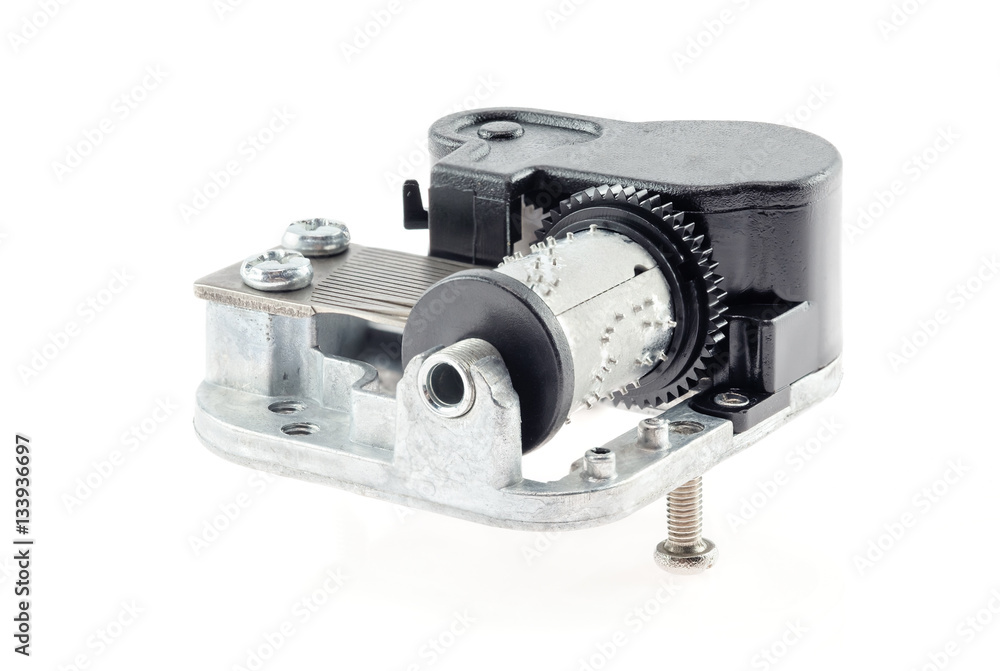 Obraz premium Music box melody mechanism / Music box melody mechanism on white background.