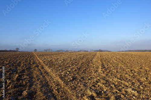 plow soil in winter