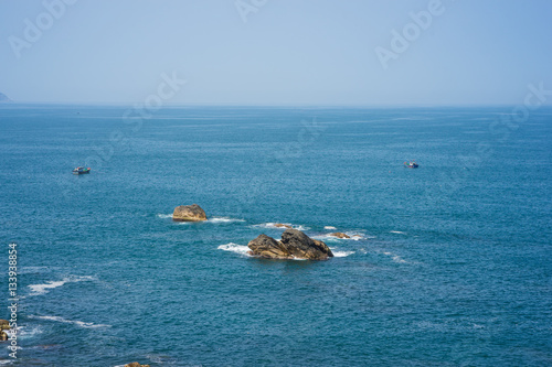 Ocean view with emerging rocks