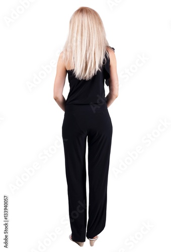 back view of standing young beautiful blonde