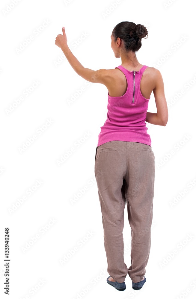 Back view of woman thumbs up. Back view of woman thumbs up.