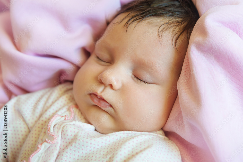 Close-up portrait of beautiful one month old baby asleep Close-up portrait of beautiful one month old baby asleep