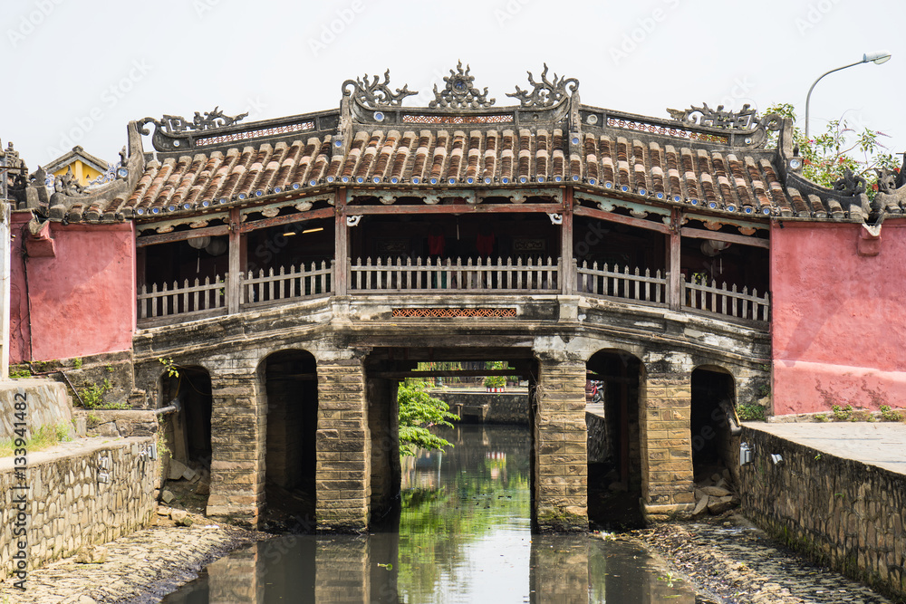 Nhat Ban bridge (Japanese covered bridge) in Hoi An ancient town. Hoi An is UNESCO site Nhat Ban bridge (Japanese covered bridge) in Hoi An ancient town. Hoi An is UNESCO site