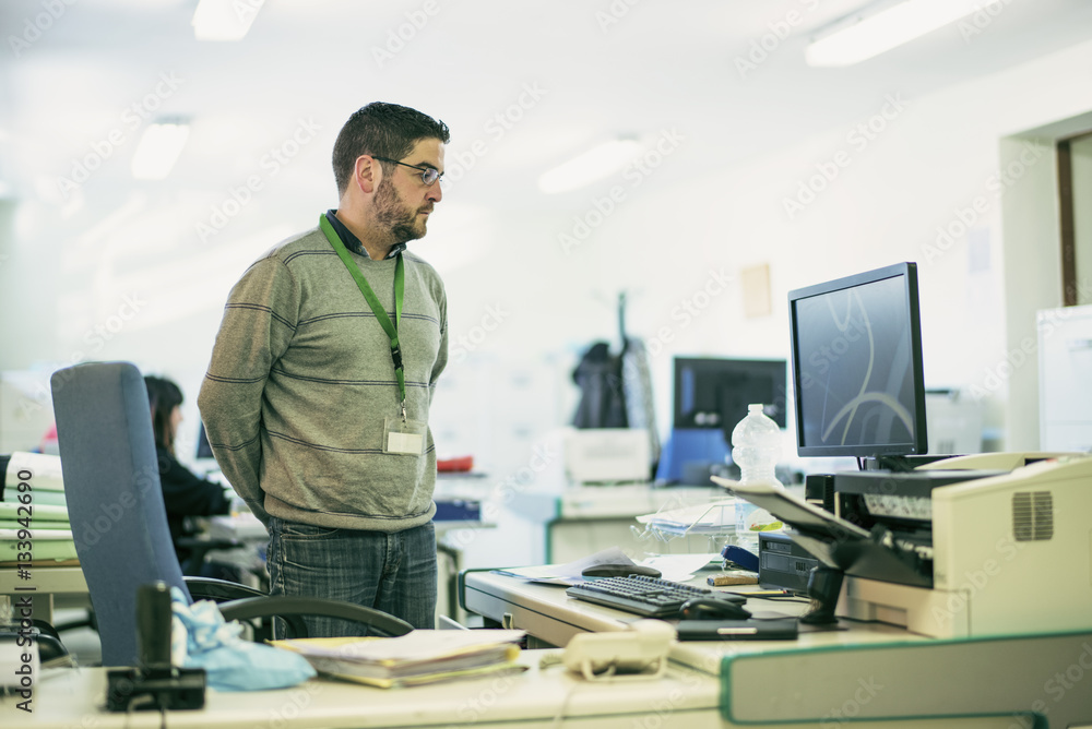 Man working at office in realistic environment Man working at office in realistic environment