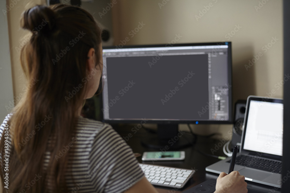 Graphic editor retoucher at workspace Graphic editor retoucher at workspace