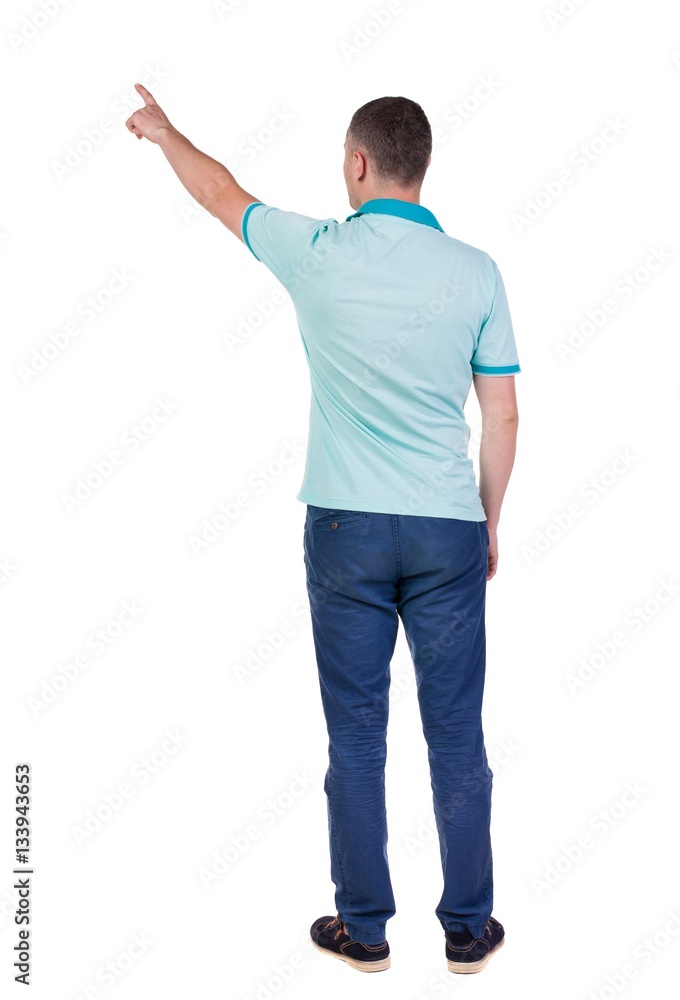 Back view of pointing young men in shirt and jeans. Back view of pointing young men in shirt and jeans.