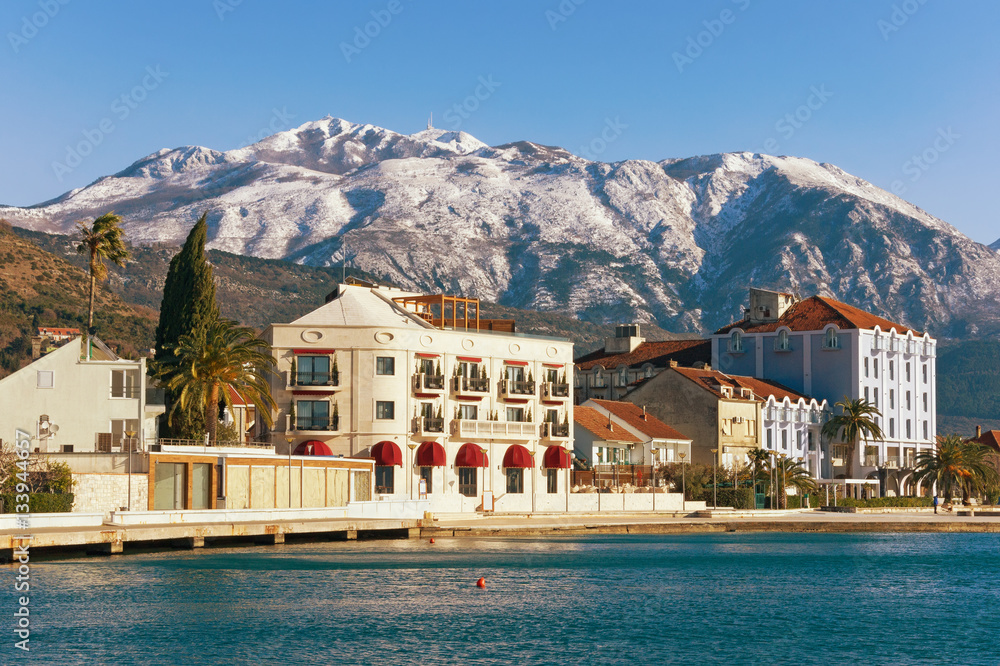 Embankment of Tivat city with Lovcen mountain in the background. Montenegro, winter