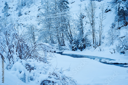 Winter mountain river after the snowfall