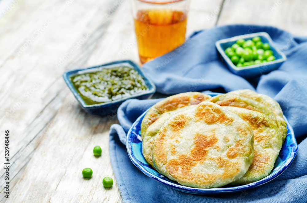 Spicy green peas Flatbread. Bengali Matar Kachori. Indian cuisin Spicy green peas Flatbread. Bengali Matar Kachori. Indian cuisin
