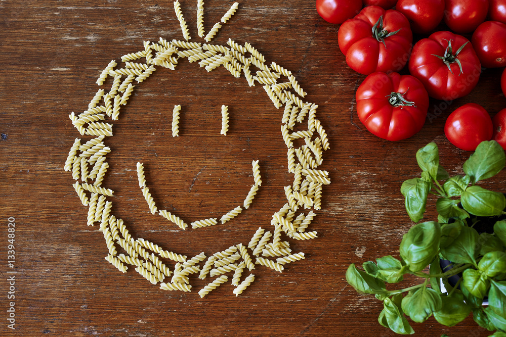 a bunch of pasta tomatoes and herbs giving space a bunch of pasta tomatoes and herbs giving space