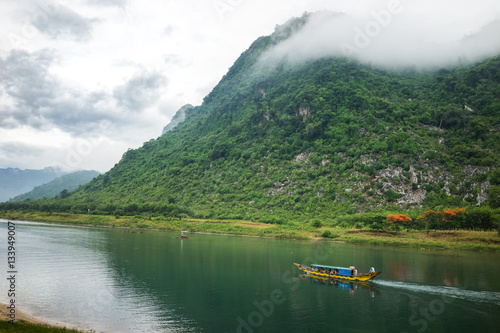 Landscape in Phong Nha-Ke Bang National Park, the river is entrance to famous tourist destination Phong Nha cave, a UNESCO World Heritage Site in Quang Binh Province, Vietnam