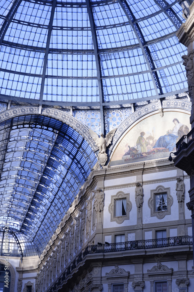 Glass dome of Galleria Vittorio Emanuele II shopping gallery. Mi