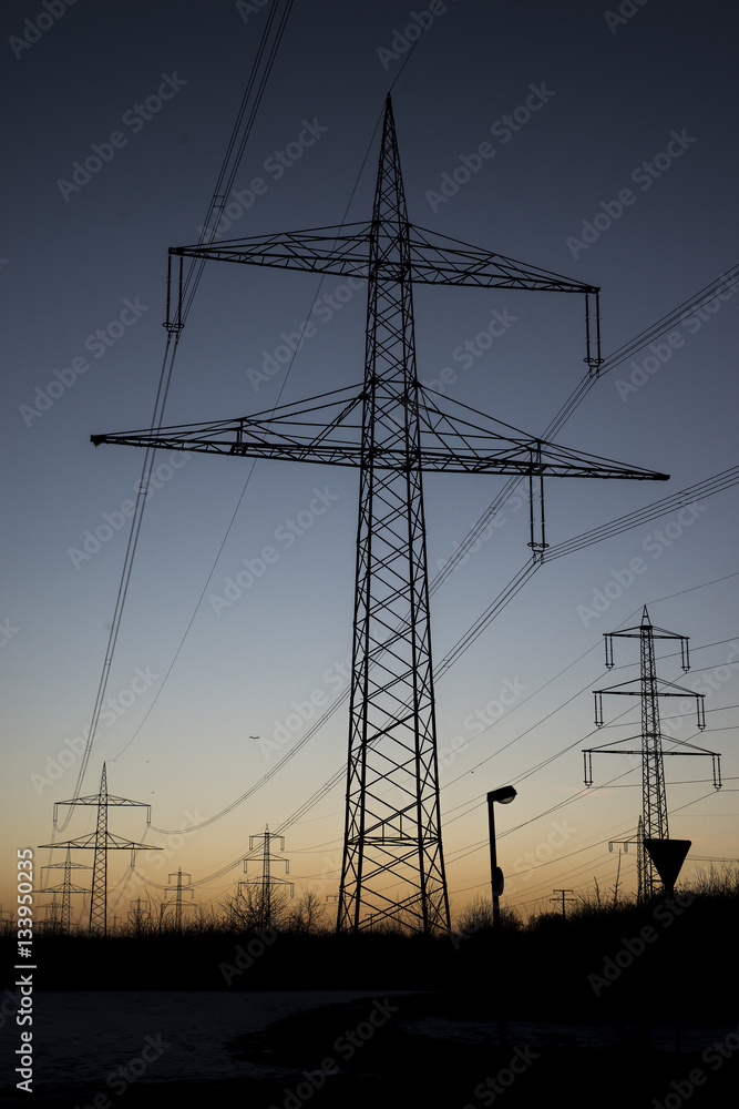 Electric power lines steel tower landscape sunset sunrise dawn silhouette