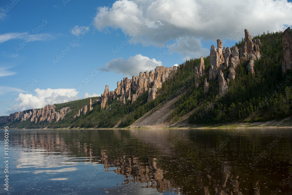 The rocky river bank with the pillars. Lena river. Yakutia. Russia.