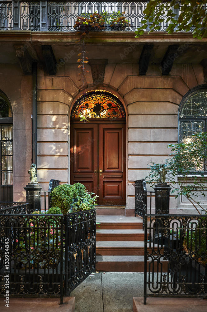 Fototapeta premium an old brick brownstone building