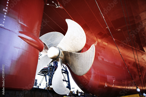 Close up of propeller on container ship photo