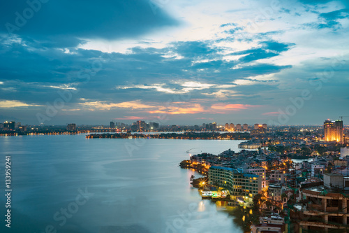 Aerial view of Hanoi skyline at West Lake. Hanoi cityscape at twilight © Hanoi Photography