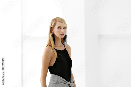 Pretty young blonde woman a...