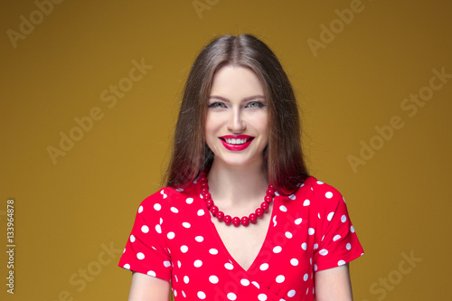 Beautiful young woman on co...