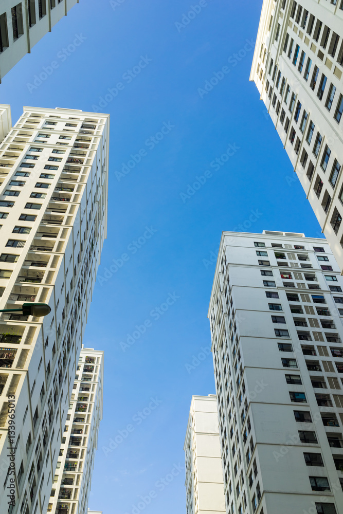 Resident apartment buildings against blue sky Resident apartment buildings against blue sky