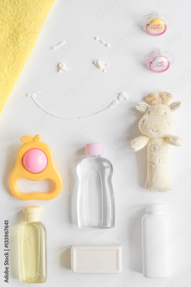 baby organic cosmetic for bath on white bakground top view baby organic cosmetic for bath on white bakground top view