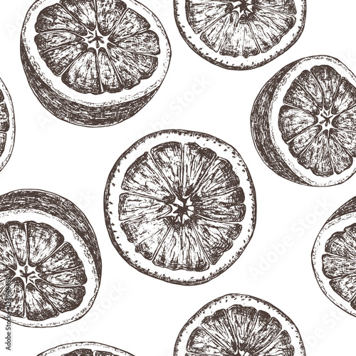 Seamless pattern of isolated hand drawn oranges in sketch style. © ZUBKOVA IULIIA