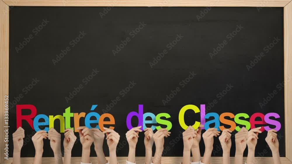 Hands holding up rentree des classes Hands holding up rentree des classes
