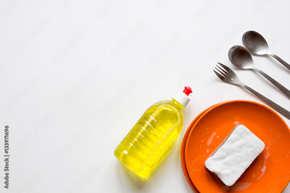 concept of washing dishes on white background top view concept of washing dishes on white background top view