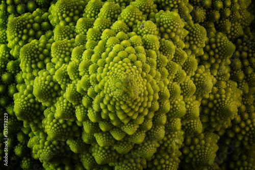 Romanesco broccoli or Roman cauliflower, close up shot from above showing the texture photo