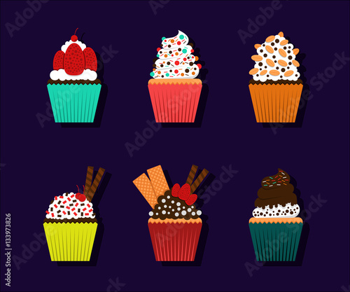 a variety of cupcakes with a variety of color and strawberry toppings, vanilla cream, chocolate cream, nuts, cookies, and cherry