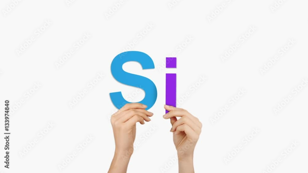 Woman hand holding letters S and I