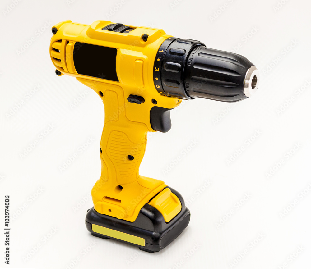 Electric drill cordless on white background Electric drill cordless on white background