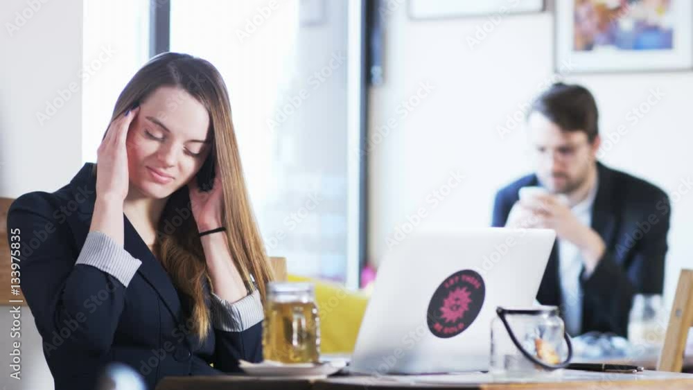 Young Businesswoman Having a Headache Young Businesswoman Having a Headache