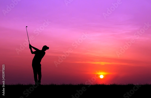 silhouette golfer playing golf during beautiful sunset © Satit _Srihin