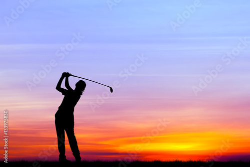silhouette golfer playing golf during beautiful sunset