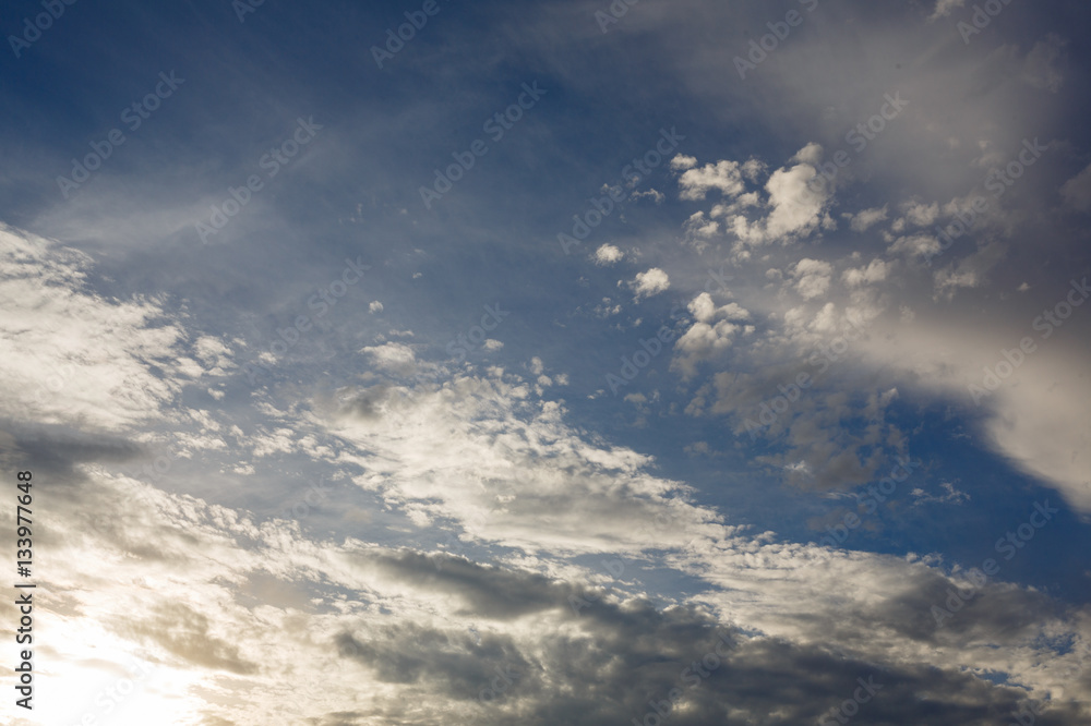 Cumulus clouds against a blue sky. Overcast. Weather forecast.