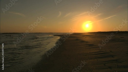 sunset on galveston texas beach