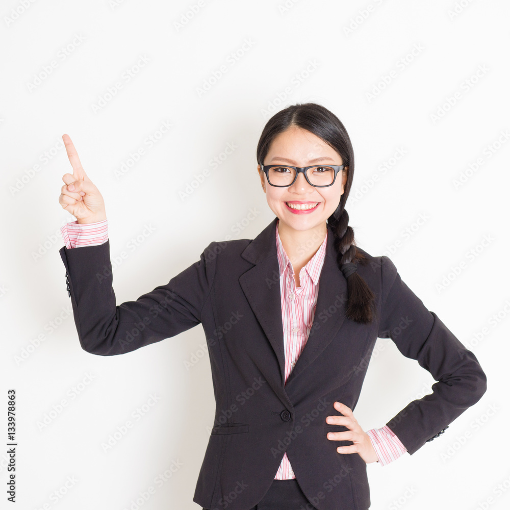 Businesswoman finger pointing something Businesswoman finger pointing something