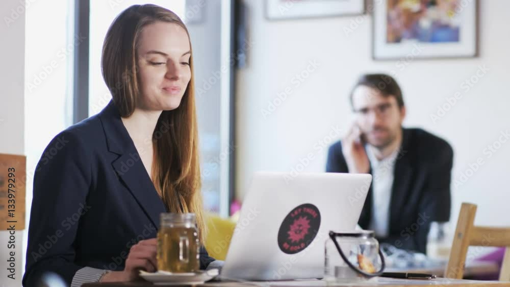 Young Businesswoman During a Nice Skype Talk Young Businesswoman During a Nice Skype Talk