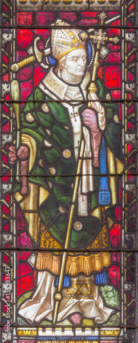 ROME, ITALY - MARCH 9. 2016: The St. Thomas Becket (from Canterbury) on the stained glass of All Saints' Anglican Church by workroom Clayton and Hall (19. cent.)