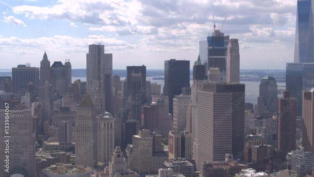 AERIAL: Flying past high modern skyscrapers in downtown New York City AERIAL: Flying past high modern skyscrapers in downtown New York City