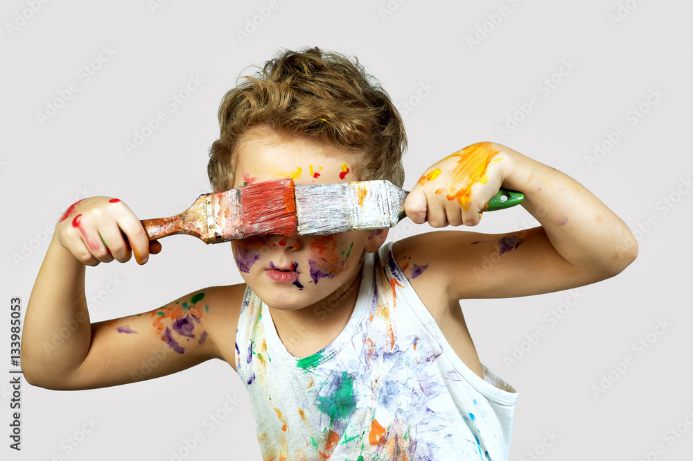 Gay boy covered in paint .