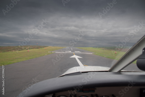 Cockpit view from a light aircraft on runway 32 of the St Mary's Airport on the Isles of Scilly.