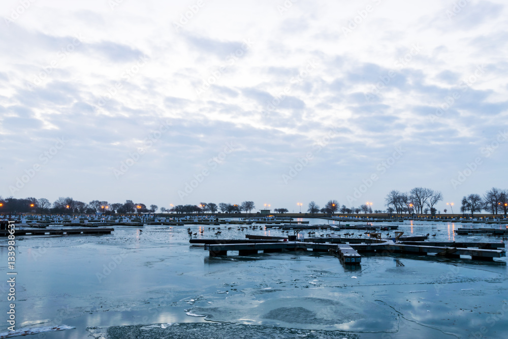 A shot of an empty harbor taken while the sun was still rising over Lake Michigan in Chicago, Illinois.